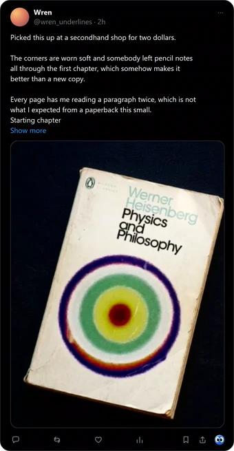 An illustrative post on X, from an invented account, showing a photograph of a worn paperback of Physics and Philosophy by Werner Heisenberg. The title is nowhere in the text of the post.